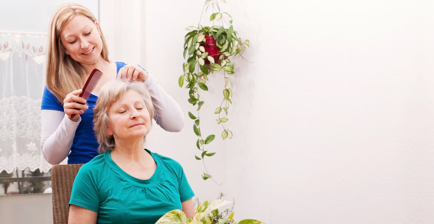 Staff and elder female bonding