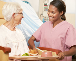 Serving food to elderly patient